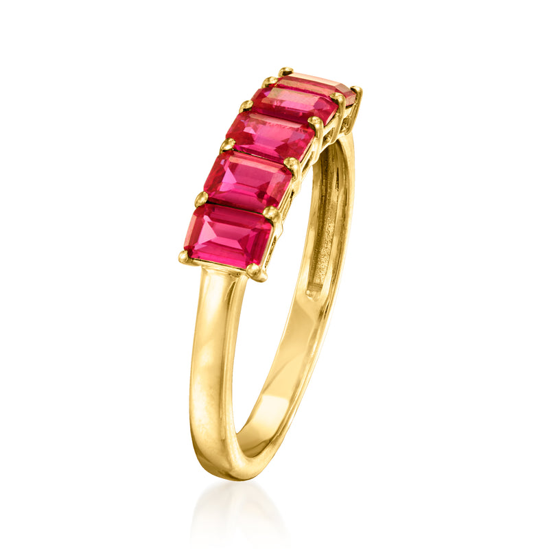 Gold vermeil ring with three rectangular pink-red lab ruby gemstones, side view