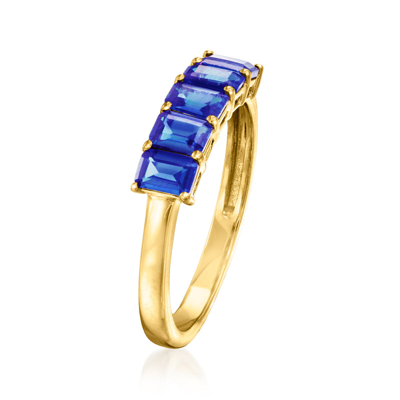 Gold vermeil sapphire ring featuring a row of blue baguette stones