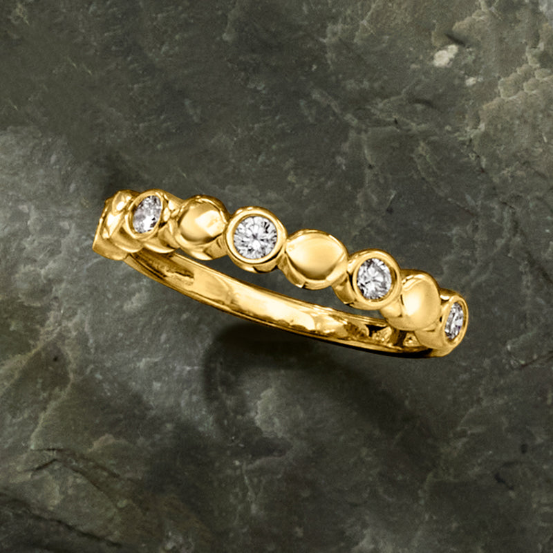Gold vermeil diamond disc ring with five circular stones and dome bead details