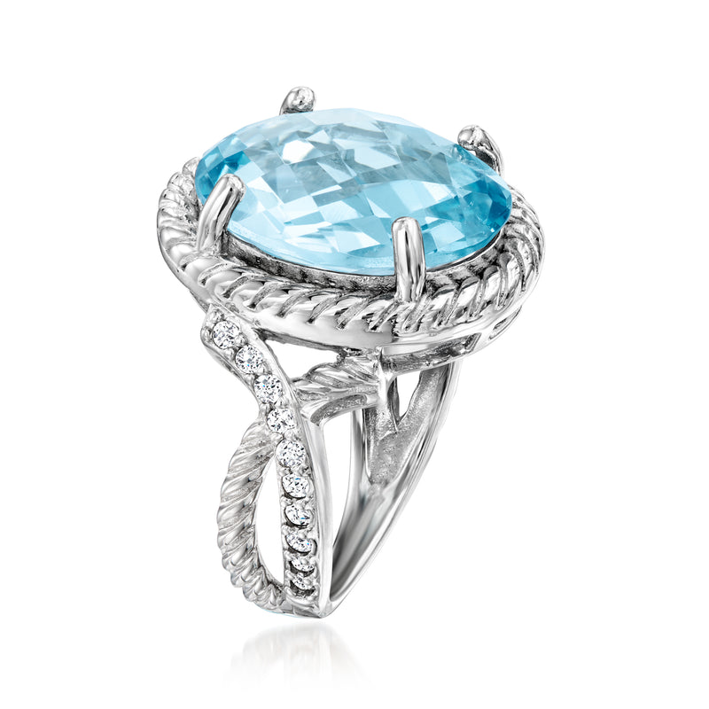 Sterling silver ring with oval sky-blue gemstone, prong halo and braided band