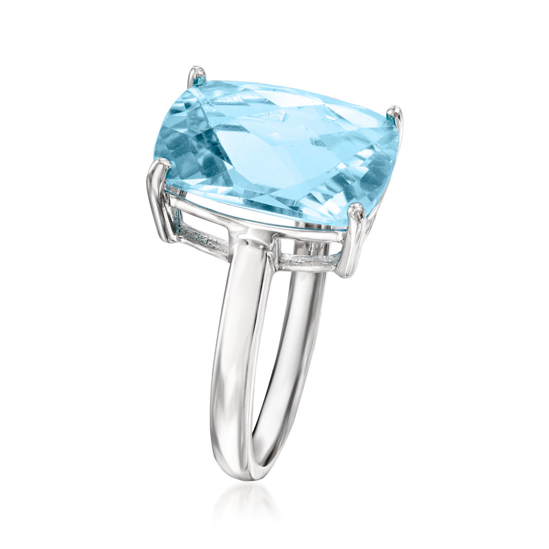 Sterling silver ring with large sky blue cushion-cut gemstone, side prongs visible