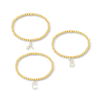 4mm 18kt Gold Over Sterling Bead Stretch Bracelet with .10 ct. t.w. Lab-Grown Diamond Initial Charm