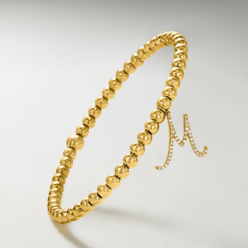4mm gold bead stretch bracelet with diamond initial M charm