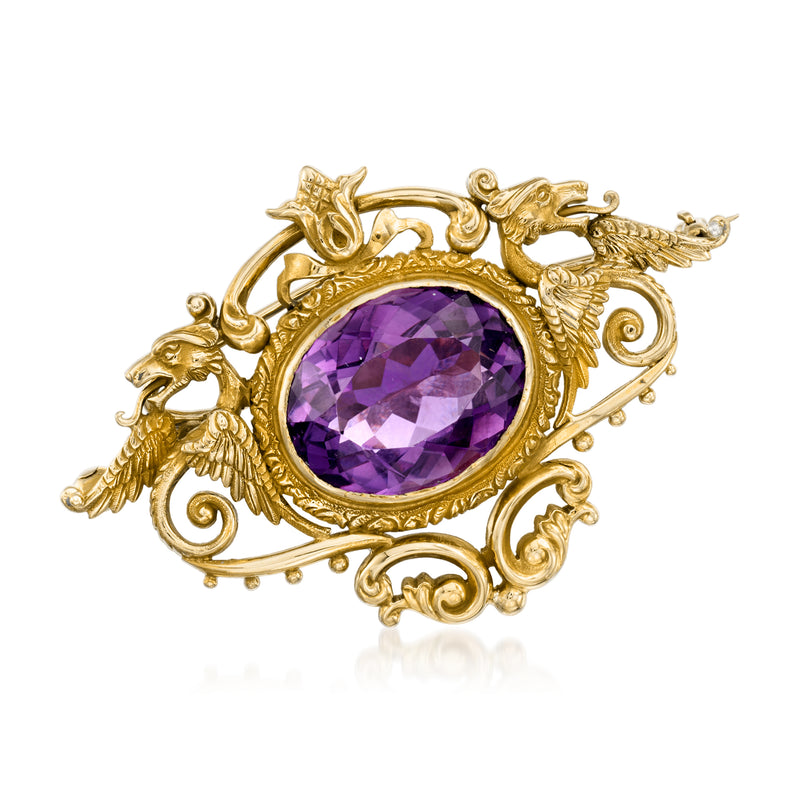 Gold filigree amethyst oval pin with ornate scrollwork bezel