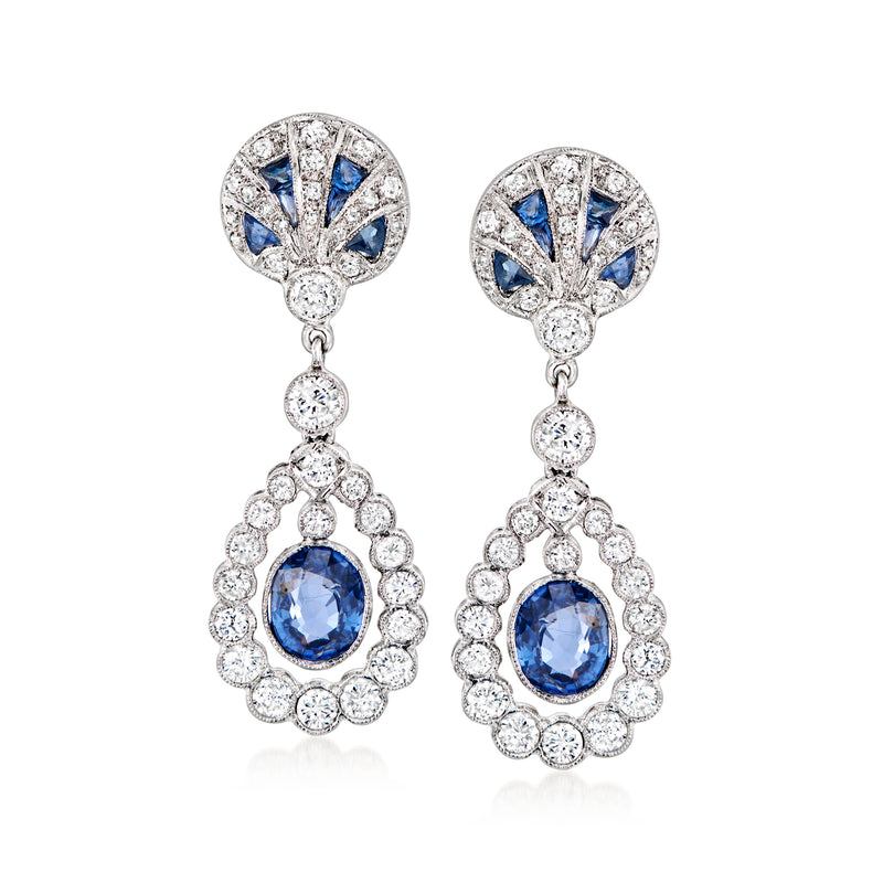 18k white gold double-drop sapphire and diamond drop earrings, blue oval center stones