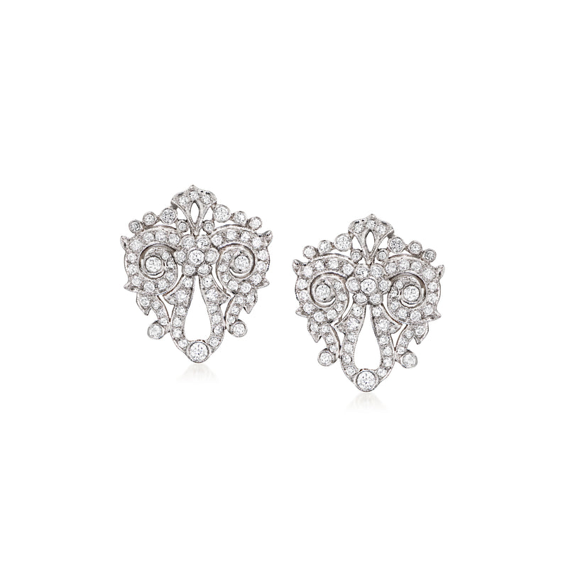 Diamond cluster stud earrings with ornate scrollwork in white gold, post backs