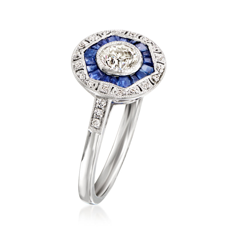 Vintage platinum ring with oval diamond, blue sapphires, and diamond accents