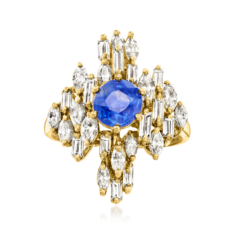 18k yellow gold cocktail ring with oval blue sapphire center and clear diamond-like stones