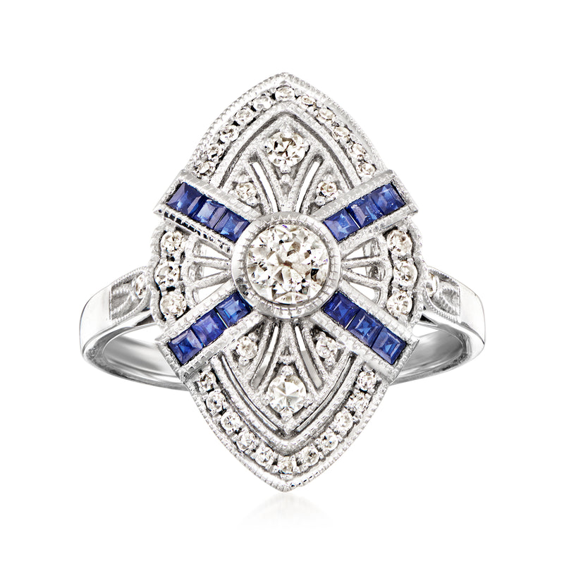 Platinum vintage navette sapphire and diamond ring with central round stone