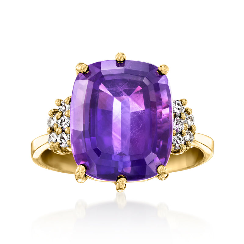 18kt yellow gold vintage amethyst ring with large cushion-cut center and diamond halo