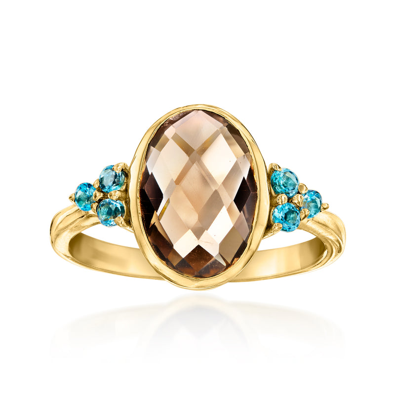 Gold-tone oval smoky quartz ring with blue topaz accents, prong-set