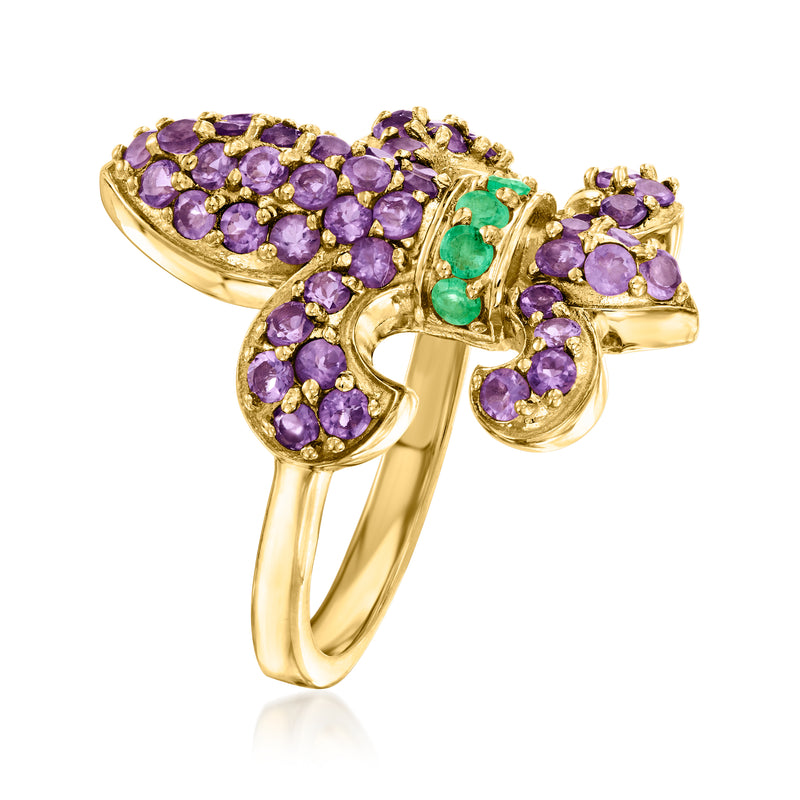 Fleur-de-lis amethyst and emerald ring, purple stones with green center in gold setting