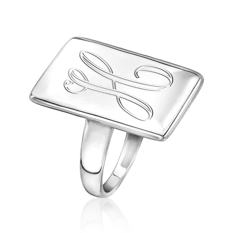 Sterling silver rectangular ring with engraved cursive initials, angled view