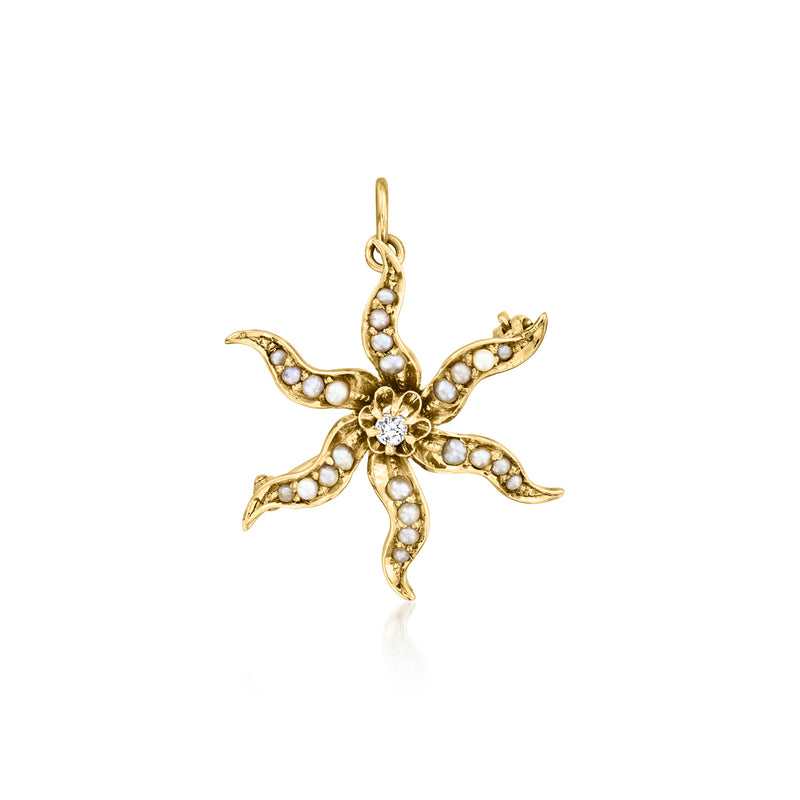 Vintage 14kt yellow gold flower pin with seed pearls, blue enamel, and diamond