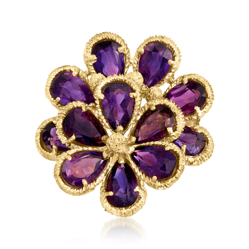 Amethyst flower cocktail ring with oval purple gemstones in textured yellow gold