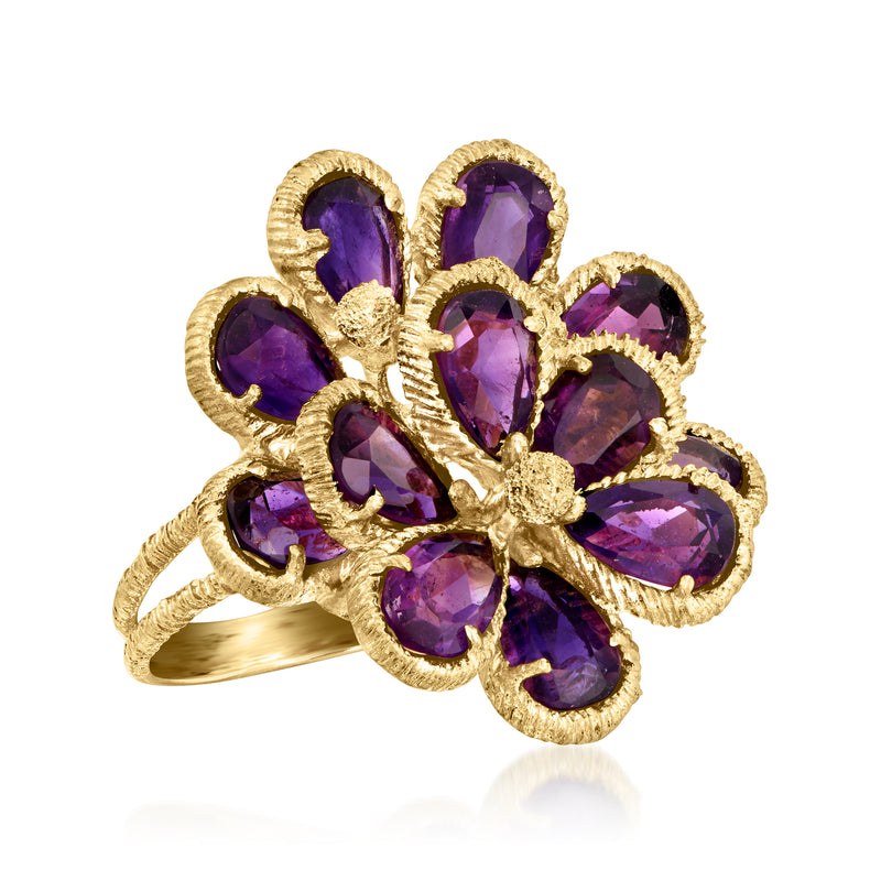 Amethyst flower cocktail ring close-up, purple oval stones on yellow gold shank