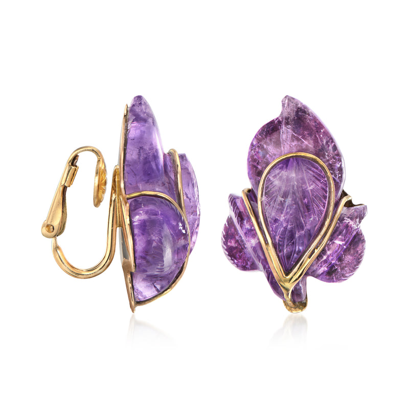 Amethyst clip-on earrings showing yellow gold clip backs and teardrop carved purple stones