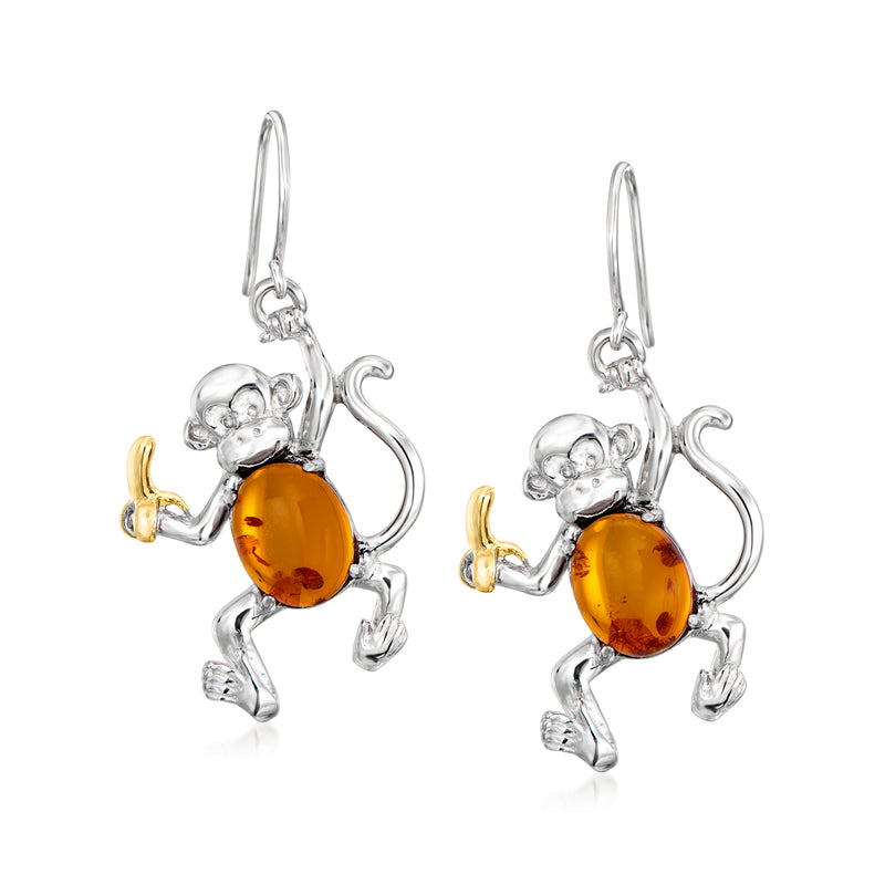 Sterling silver monkey drop earrings with oval amber cabochon and gold-tone accents