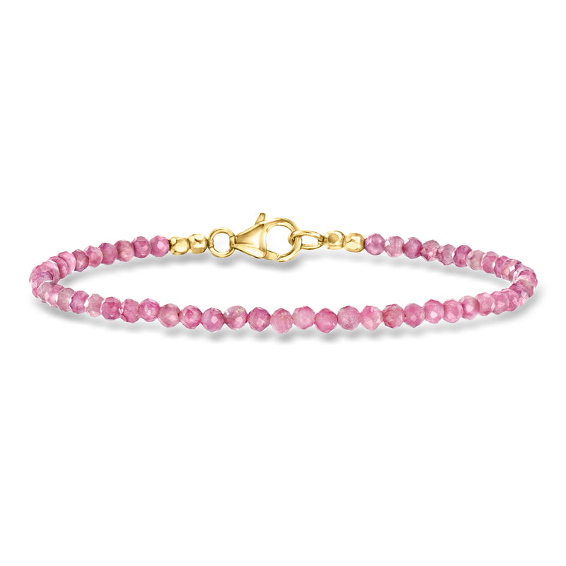 Pink tourmaline bead bracelet with gold clasp and small round bead links