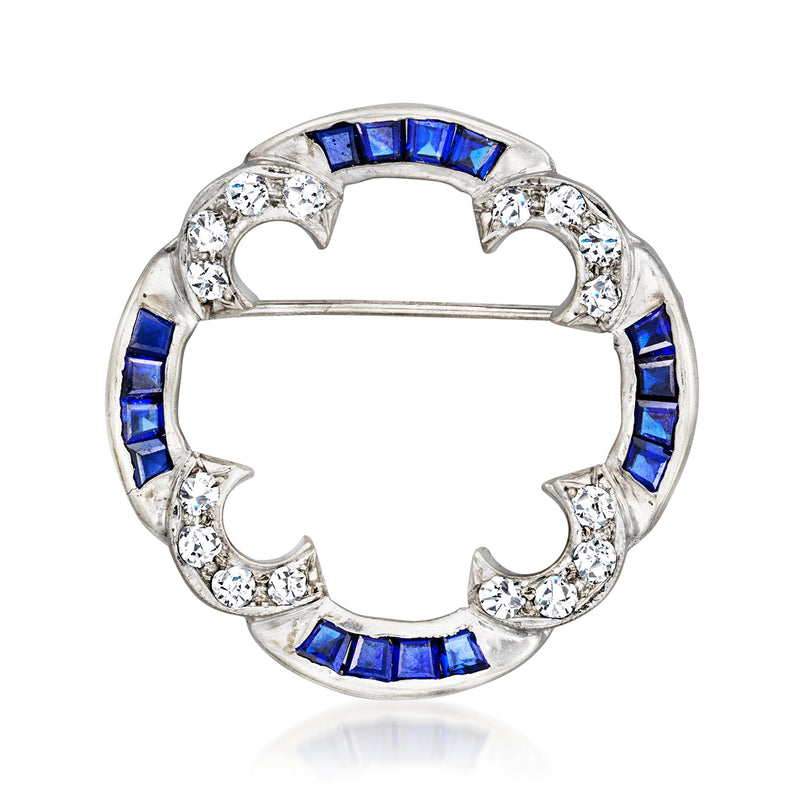 14kt white gold circular pin with blue sapphire baguettes and diamond accents