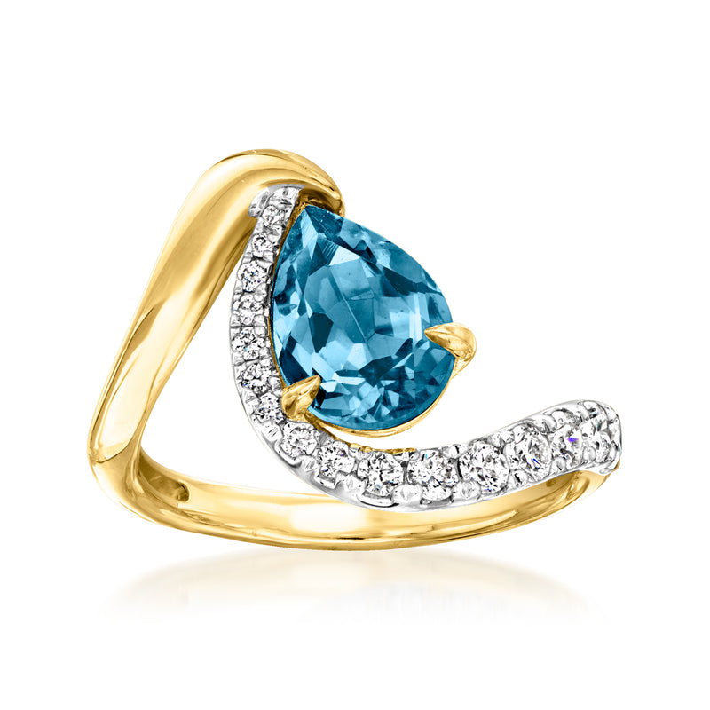 Gold teardrop London blue topaz ring with white diamond accents and split prongs