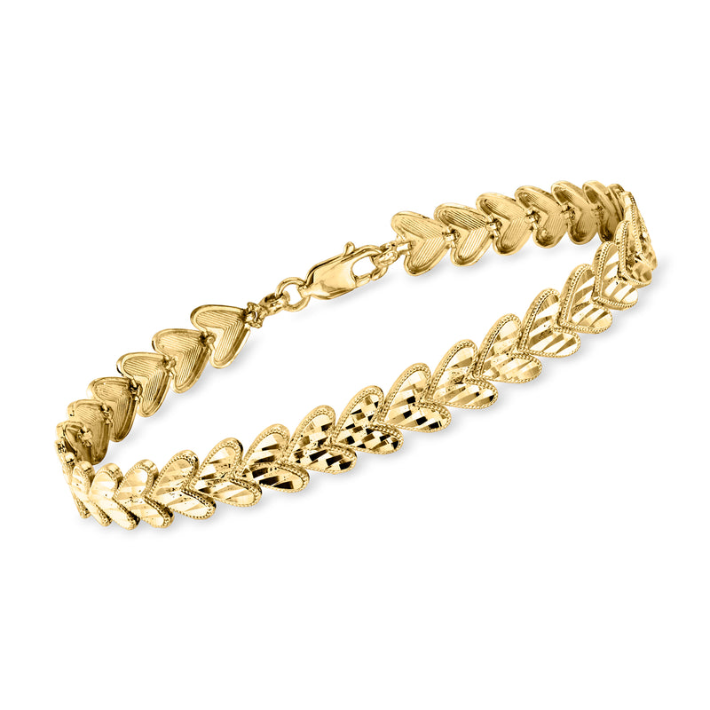 C. 1990 vintage 14k yellow gold heart-link bracelet with toggle clasp