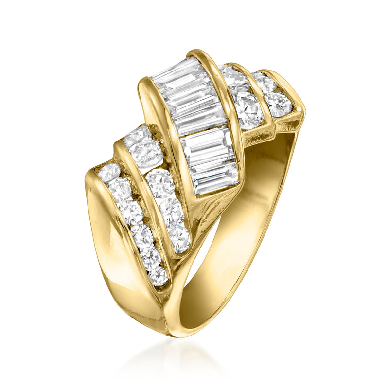 18kt yellow gold diamond ring, baguette center stone with round side diamonds