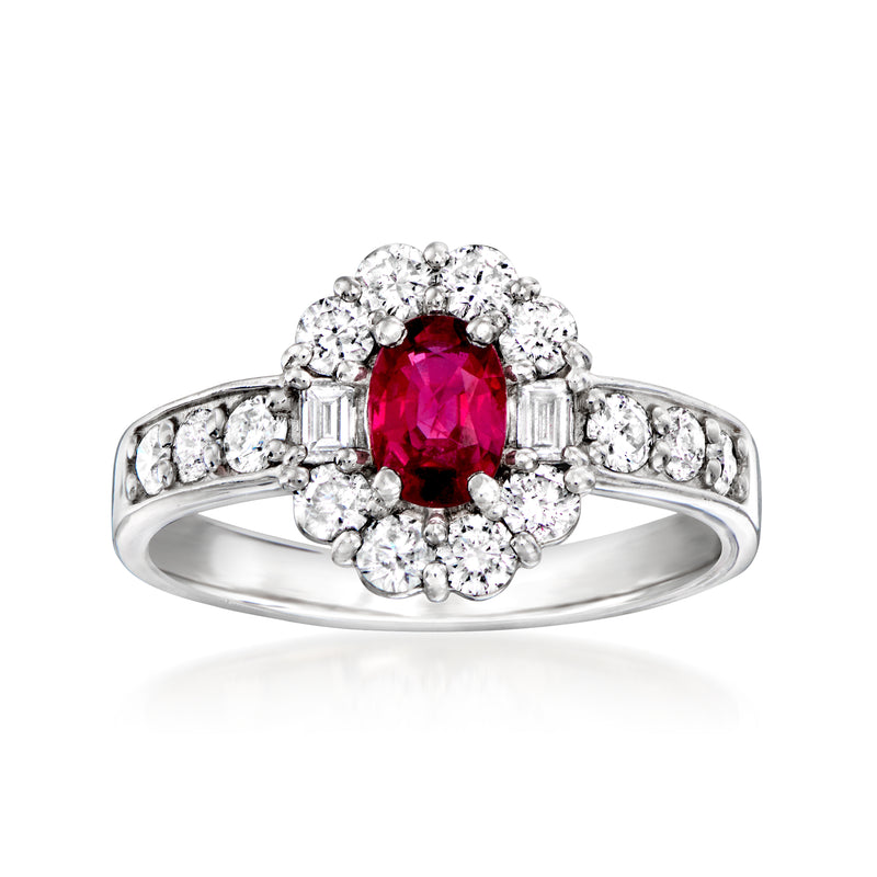 Platinum vintage ruby and diamond cluster ring with round red center stone and halo