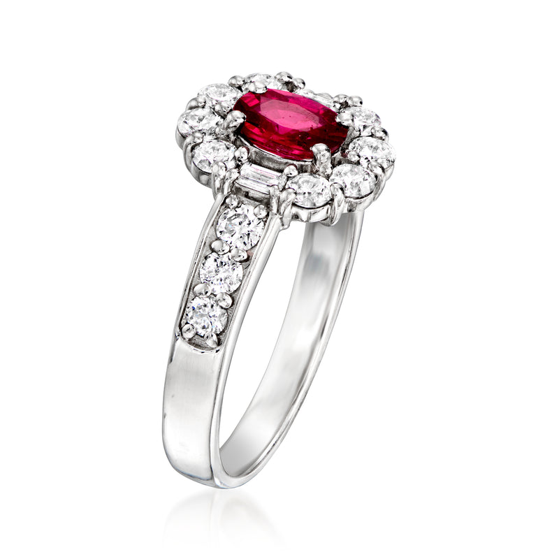 Platinum vintage ruby and diamond ring with prong-set red center and diamond halo