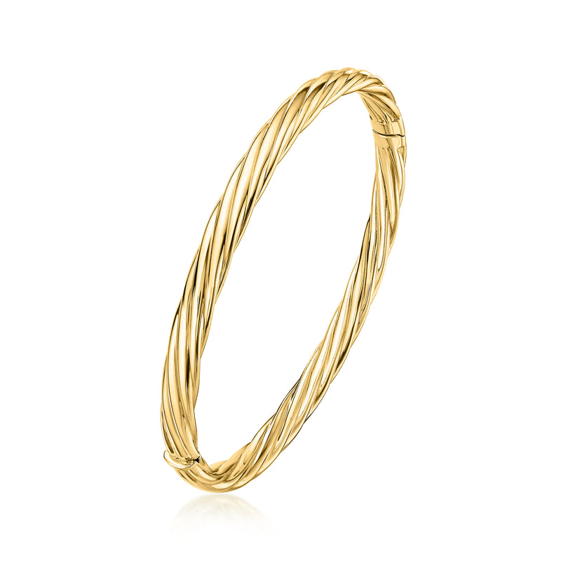 Twisted 14kt yellow gold bangle bracelet, oval profile with braided ridges