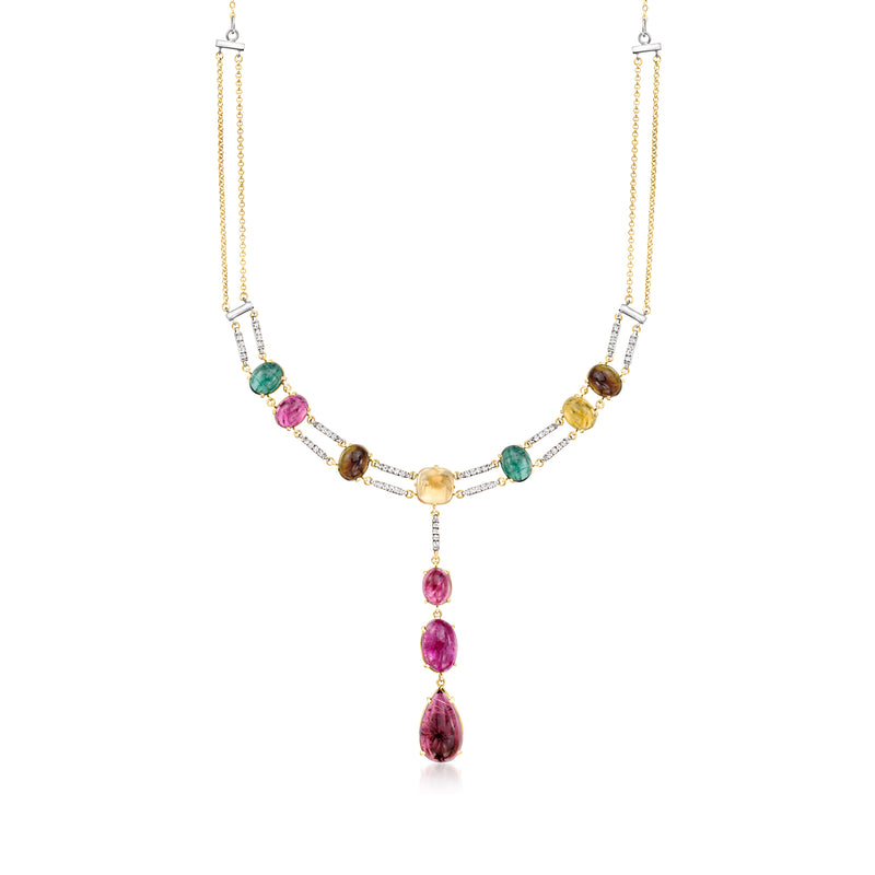 Two-tone gold necklace with multicolor gemstones, diamond accents, and dangling teardrop