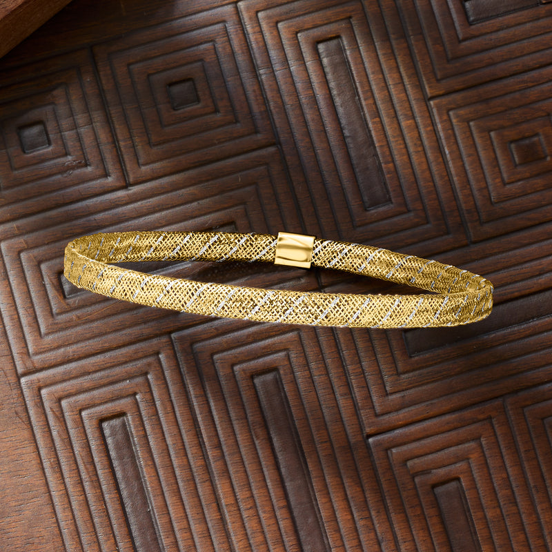 Gold mesh stretch bracelet viewed from side, with rectangular clasp