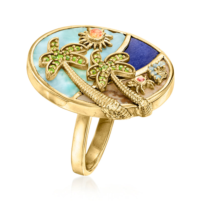 Gold-tone oval beach ring, side view, with palm trees, sun, and pink/green gemstone accents