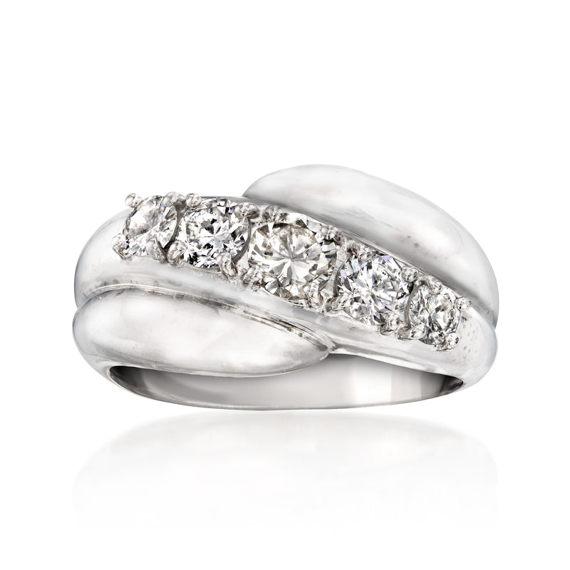 Vintage platinum diamond ring with row of round brilliant-cut diamonds across top