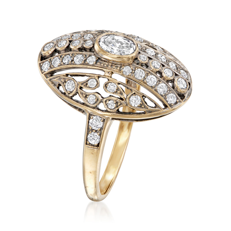 Vintage 18kt yellow gold oval diamond ring with striped openwork design