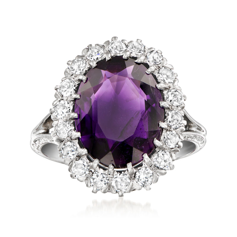 Vintage amethyst cocktail ring with oval purple stone and diamond halo on white metal
