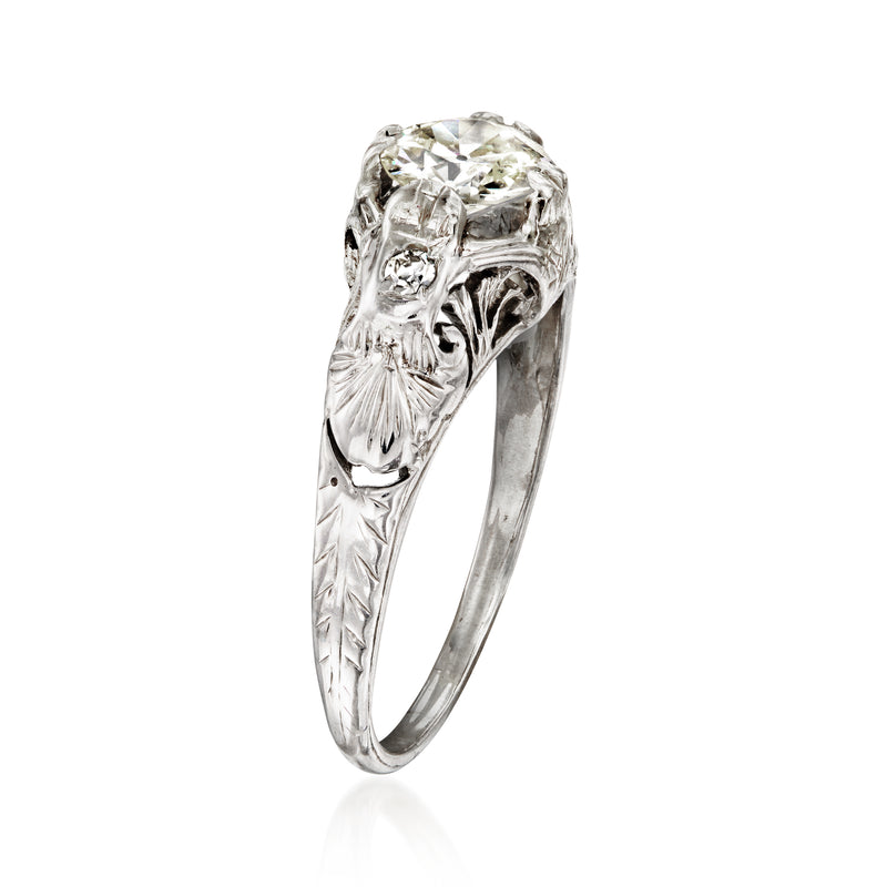 Round center diamond ring with etched side details in 18k white gold