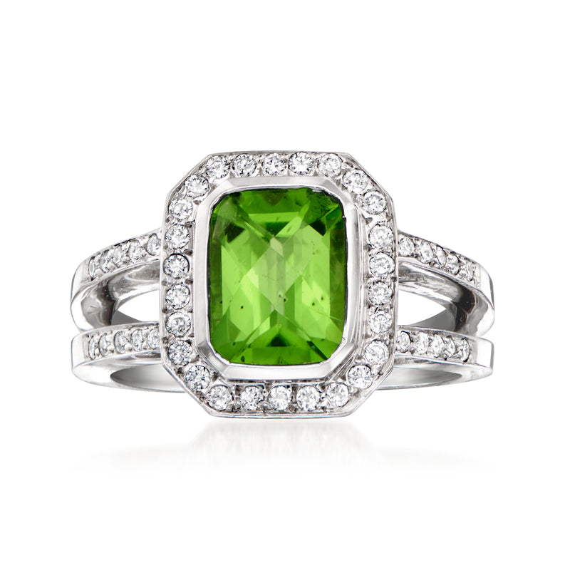 14k white gold cushion peridot ring with diamond halo and split shank