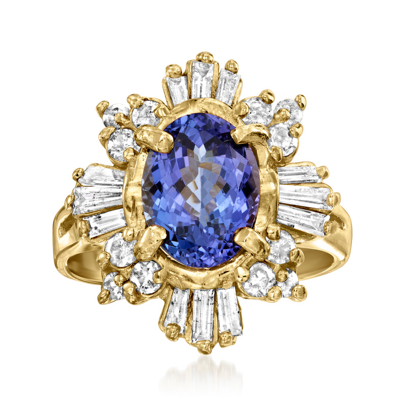Vintage tanzanite and diamond ring with blue oval center, baguette and round diamonds, 14k gold