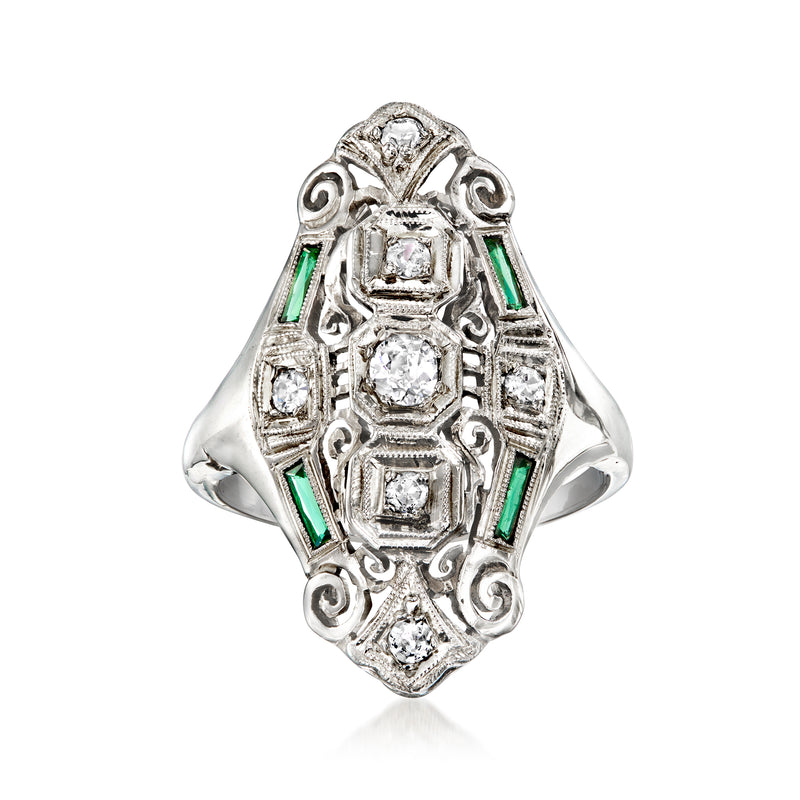 Vintage white gold ring with diamonds and green simulated emerald side accents