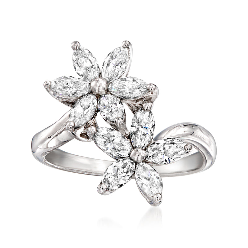 Vintage diamond flower bypass ring in 18kt white gold, sparkling marquise petals.