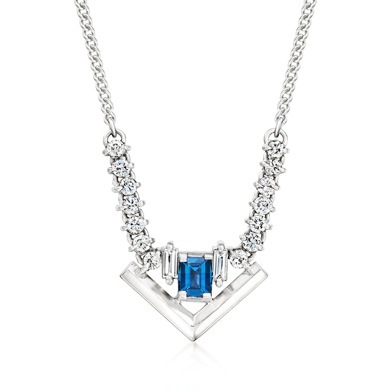 Geometric platinum necklace with blue sapphire center and diamond accents, V-shaped