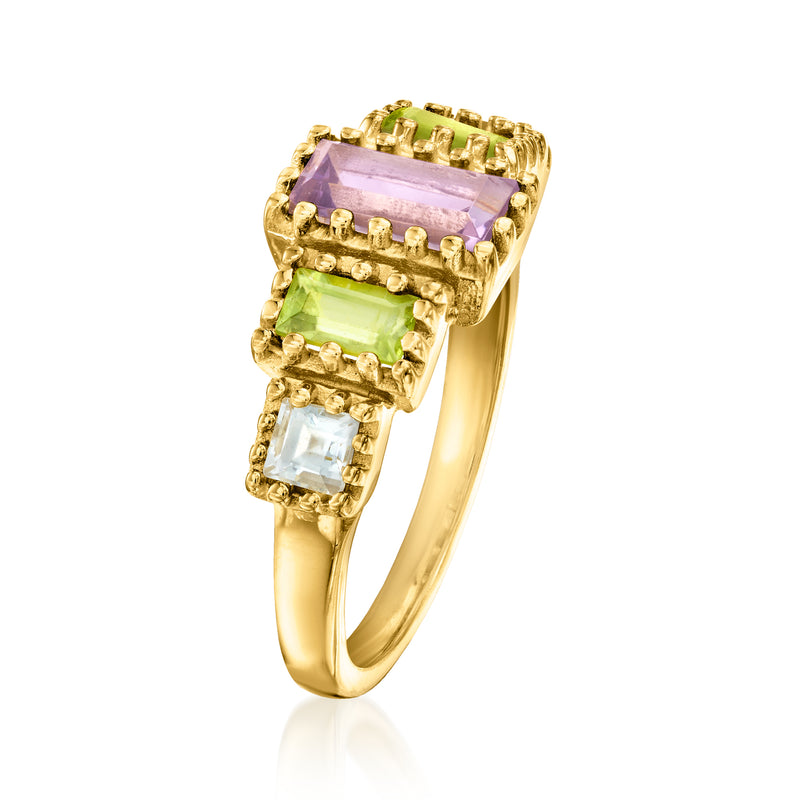 Gold multi-gemstone ring angled view, rectangular purple top with green and light blue stones