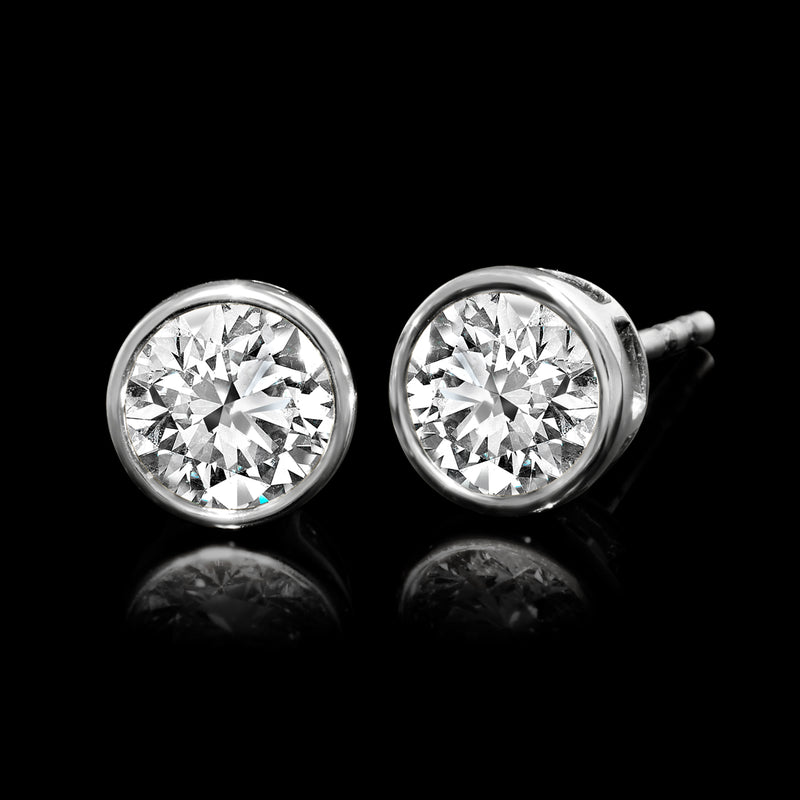 Bezel-set round lab-grown diamond studs in 14k white gold with posts visible
