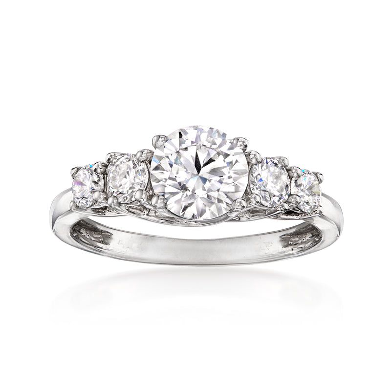 Five-stone lab-grown diamond ring in white gold with a central oval-cut center
