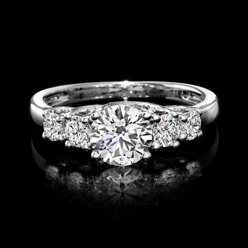 Five-stone lab-grown diamond ring top view with central round-cut stone