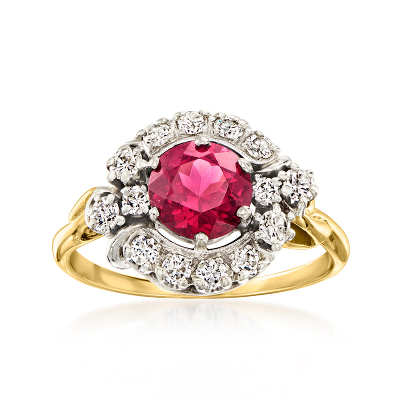 14k yellow gold ring with oval rhodolite garnet center, diamond halo