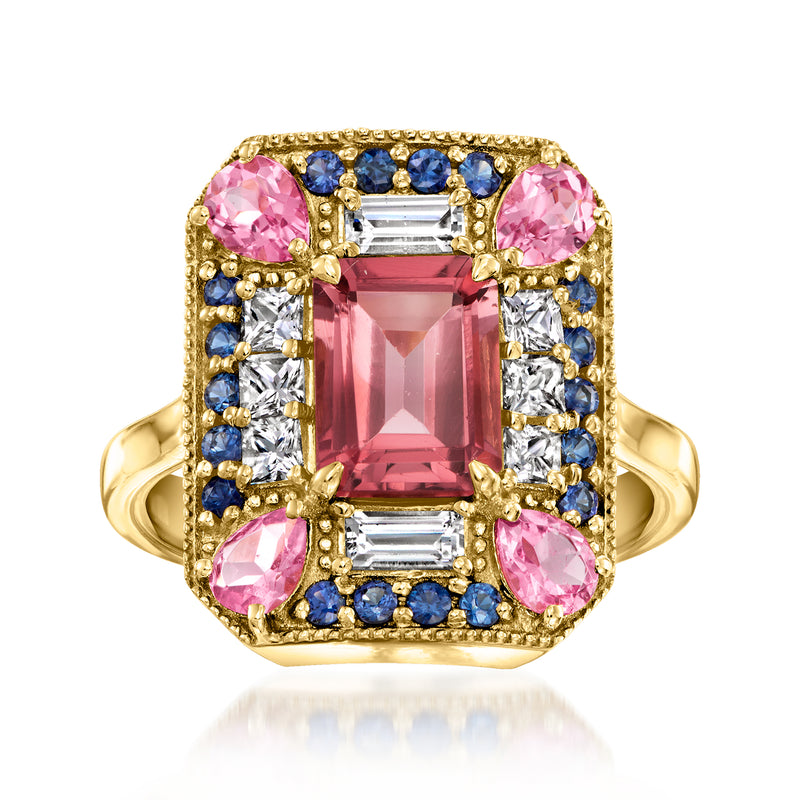 14kt yellow gold ring with pink tourmaline center and blue and white sapphire accents