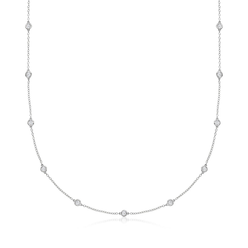 14kt white gold diamond station necklace with small round bezel-set stones