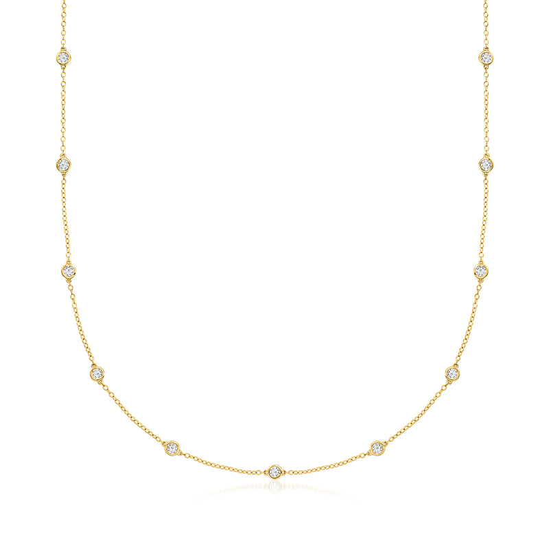 14kt yellow gold diamond station necklace with bezel-set round diamonds on chain